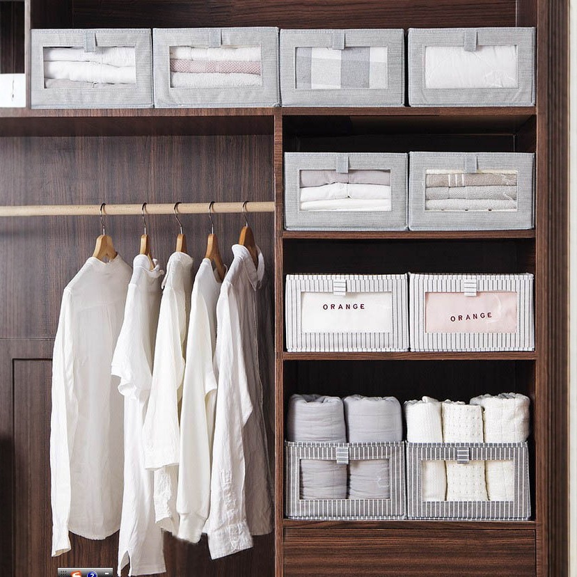 Organized closet with foldable storage boxes
